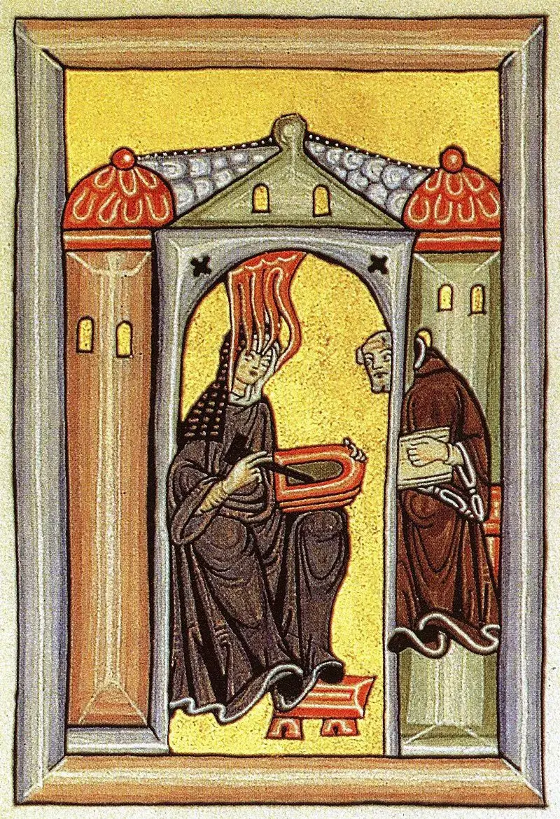 Medieval illustration of a crowned figure reading a book inside a castle.